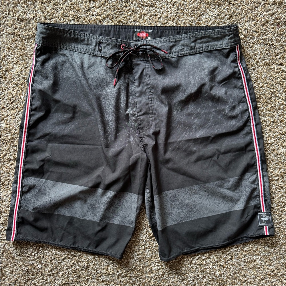 Vans Men’s black and grey Nathan Florence swim surf board shorts in size 36
